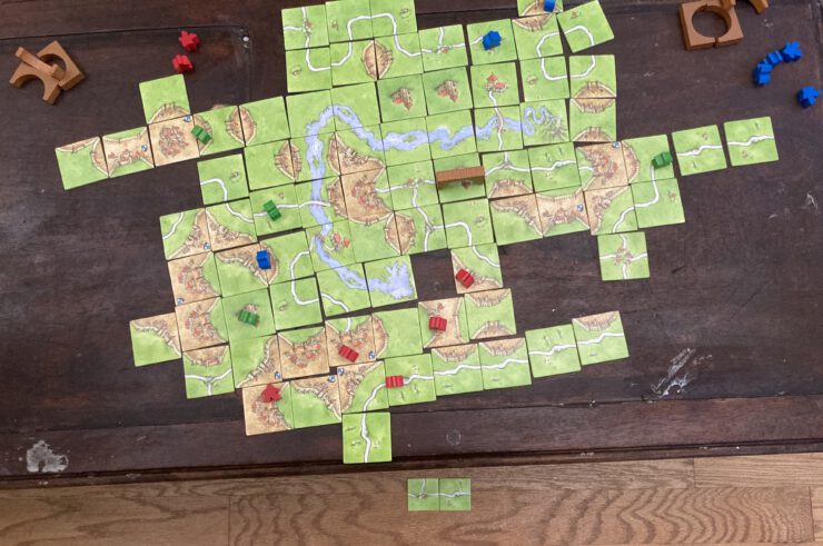 Completed Carcassonne game with a bridge
