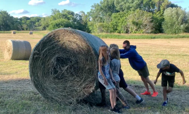 Rolling hay in Minnesota.